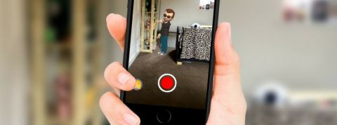 Gabsee Une main tient un smartphone