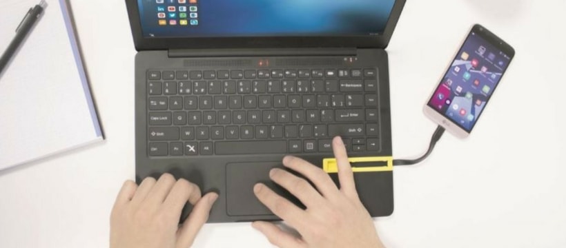 Miraxess telephone portable connecte a un ordinateur