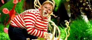Augustus Gloop, dans Charlie et la Chocolaterie, en train de manger de la crème