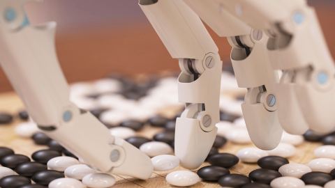 Une main robot qui joue au Go