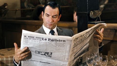 OSS 117 lit le journal