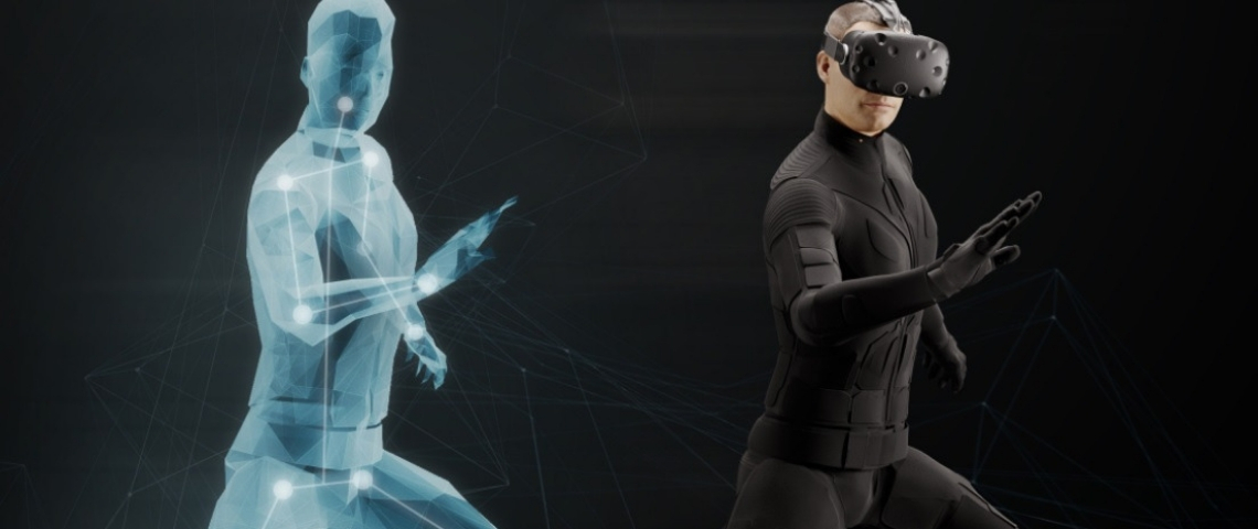 La VR s'attaque au tactile. Tous en combi ! un homme dans une combinaison de réalité virtuelle