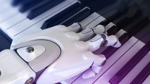 une main robotique sur des touches de piano