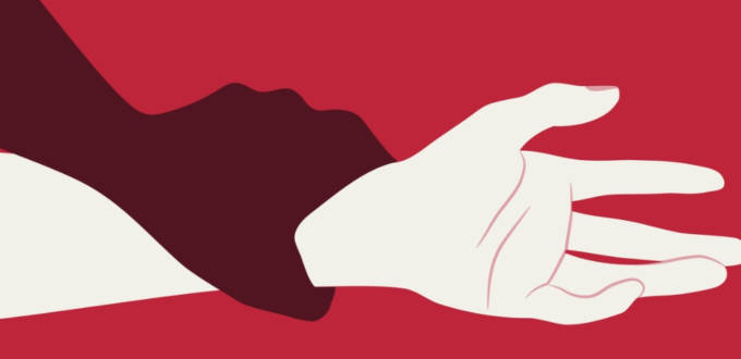 un bras d'homme emprisonne un bras de femme