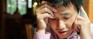 Un chinois en détresse au téléphone