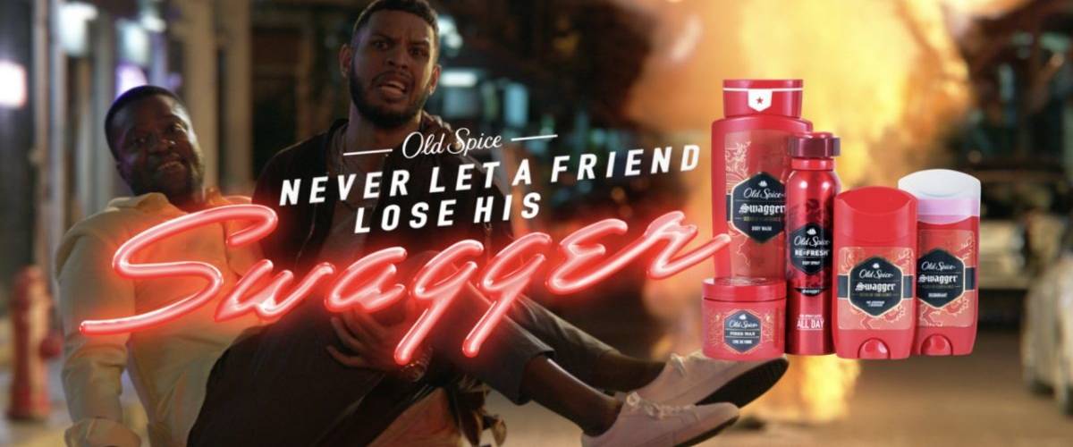 Campagne: Old Spice fait sortir les hommes de leur zone de confort Un homme porte son meilleur ami devant une explosion dans la rue