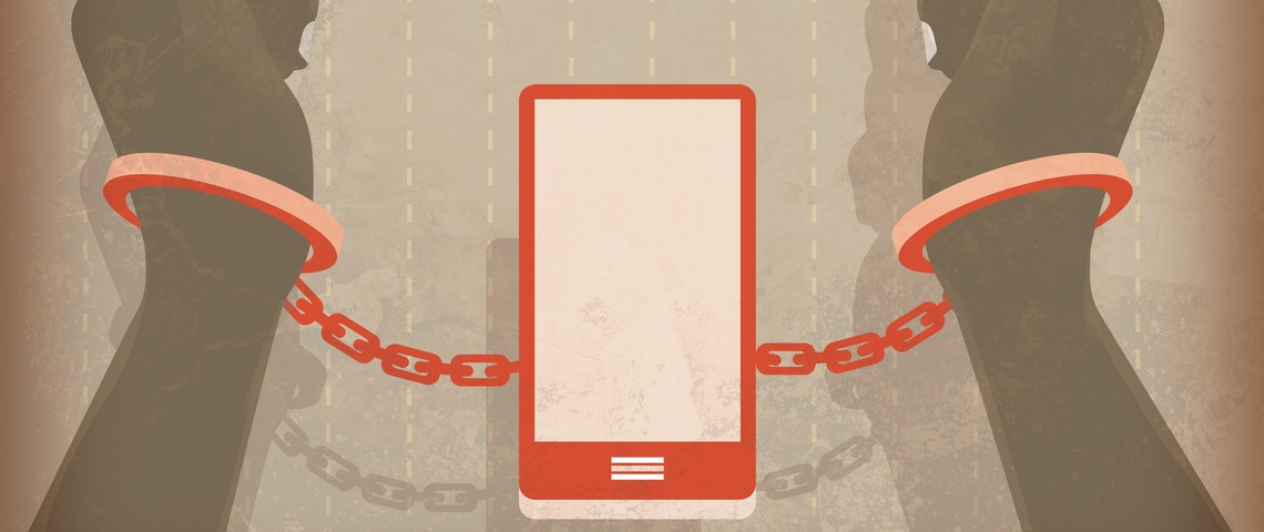 Nir Eyal : Penser que tout le monde est addict à son smartphone est une idée stupide Main menottée à un smartphone