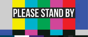 une page d'attente de la télévision avec écris Please Stand By