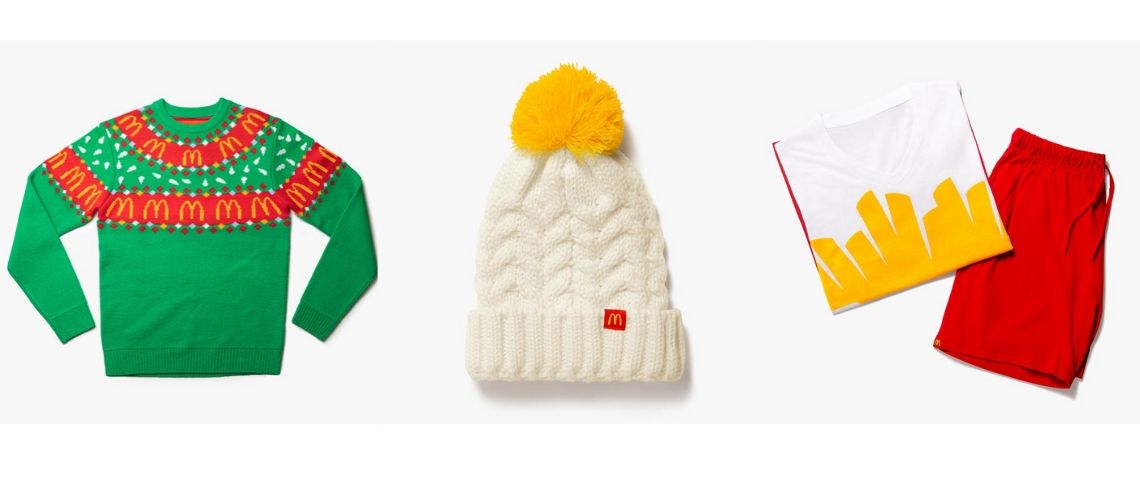 Mc Donalds lance une nouvelle marque de mode avec une ligne qui fera honneur à son big mac et à ses frites Collection Holidays Mc Donalds, avec un pull, un bonnet blanc et un ensemble t-shirt et short