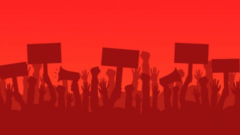 des silhouette de gens en manifestation