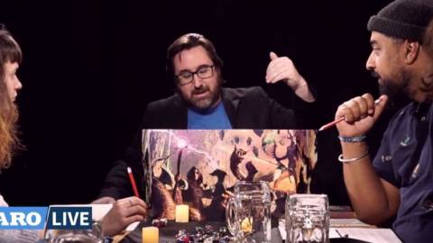 Un groupe de joueurs autours d'un table pour une partie de jeu de rôle