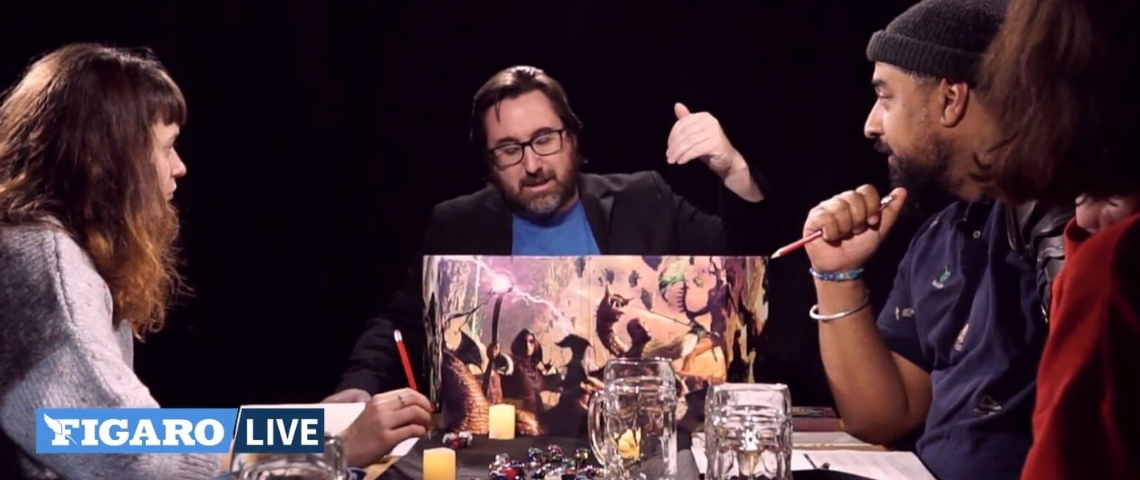Le jeu de rôle en streaming sur Twitch Un groupe de joueurs autours d'un table pour une partie de jeu de rôle