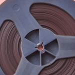 Une pellicule sur fond rose