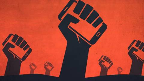 Une affiche de propagande montrant des mains tenants des portables