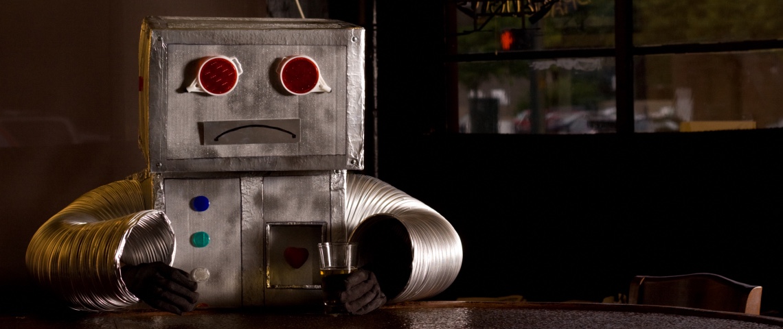 L'IA ne rapporte pas gros aux entreprises qui la déploient Un robot triste au bar