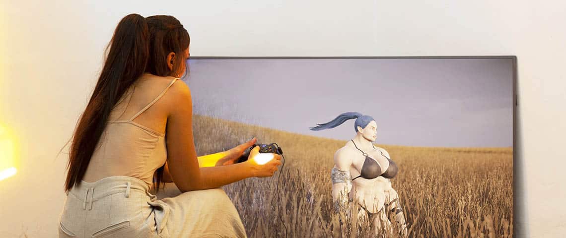 Pastoral-Hamouda - L'ADN Fille de dos dans la nature jouant à un jeu vidéo sur une grande TV
