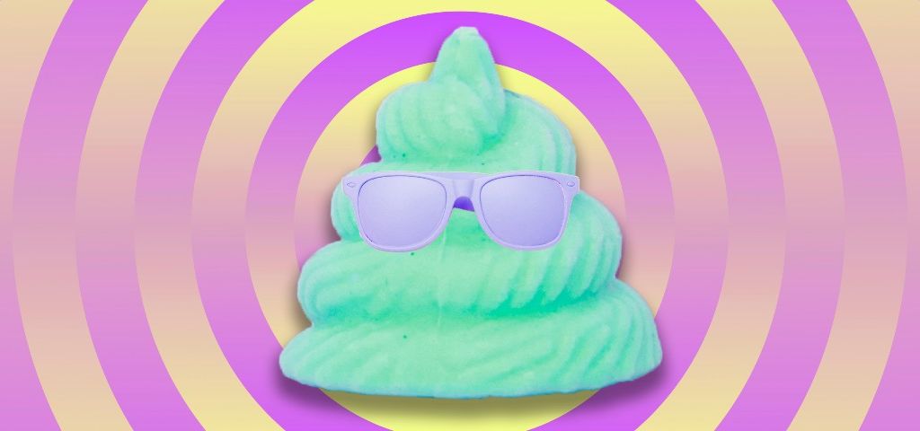 Un emoji caca vert porte des lunettes de soleille