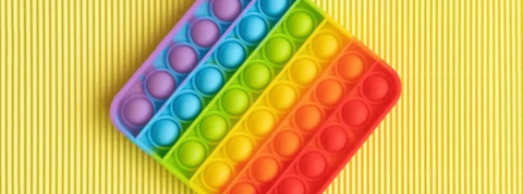 Pop it Des bulles colorées sur fond jaune