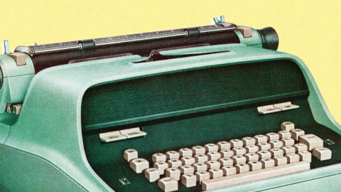 une machine à écrire verte sur fond jaune
