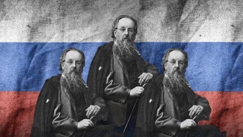 Constantin Tsiolkovski devant le drapeau russe