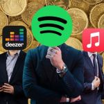 Logos de spotify, deezer et apple music sur fond d'argent