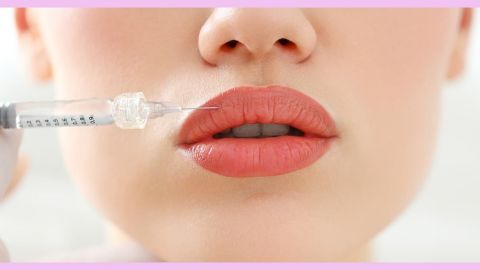 Gros plan sur lèvres et seringue pour injection