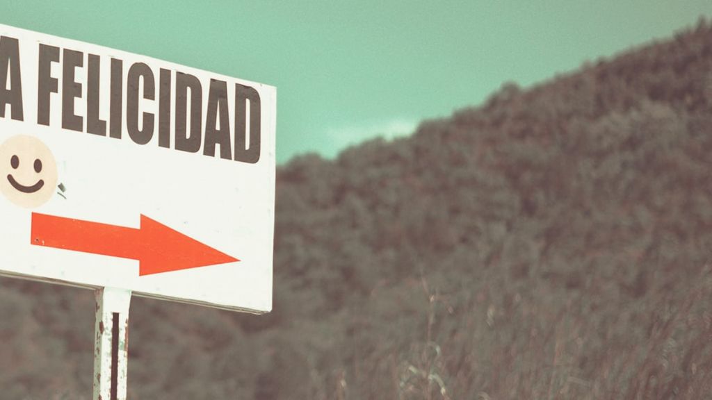 Panneau de direction avec un smiley