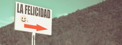 Panneau de direction avec un smiley