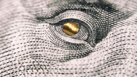 Dollar US avec pupille en bitcoin