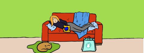 Pourquoi avons-nous la flemme de tout ? Une fille allongée sur un canapé