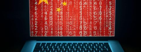 Pékin vise à chasser les PC étrangers du gouvernement et des entreprises d'État Oridnateur avec un drapeau chinois