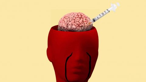 Cerveau avec une seringue