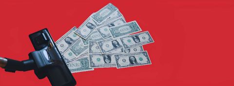 Etude sur l'inflation Un aspirateur avec des dollars