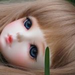 poupée-dans-lherbe