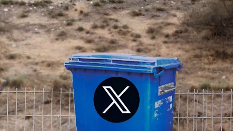 Poubelle bleue avec logo X, devant barrière et soldat en fond