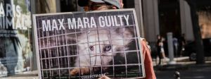 Affiche "Max Mara guilty" avec un vison en cage