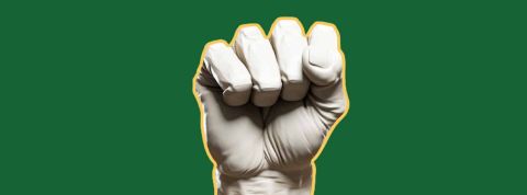 Les tendances de l'activisme en ligne en 2023 Un poing fermé sur fond vert