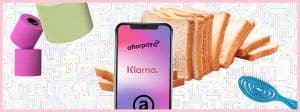 Un smartphone avec les logos des applis d'achat et du pain de mie, du papier toilette de couleur, une borsse à cheveux
