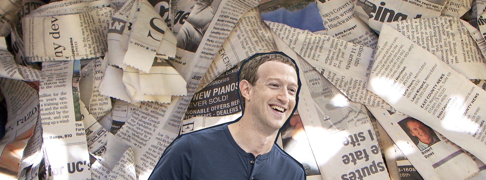 Une image de zukcerberg qui rigole sur une pile de journeaux