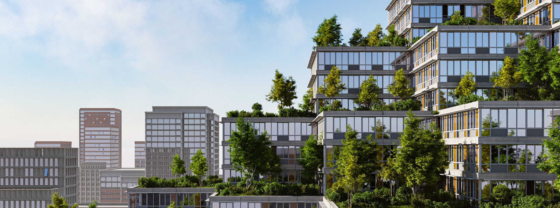 Villes : pivoter vers un modèle régénérateur doit être l'action prioritaire à mener - L'ADN Un immeubel moderne avec de grandes terrasses très végétalisées