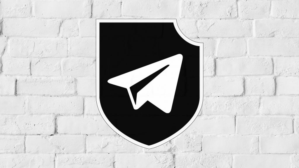 Terrorgram : les réseaux terroristes d'extrême droite veulent mener un « Djihad blanc »  Le sigle de terrorgram sur un mur de briques blanches