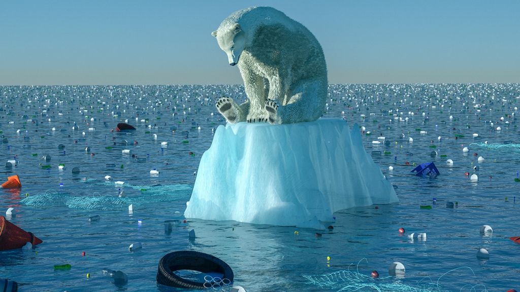 Un ours polaire sur un bout de banquise dans une mer très polluée