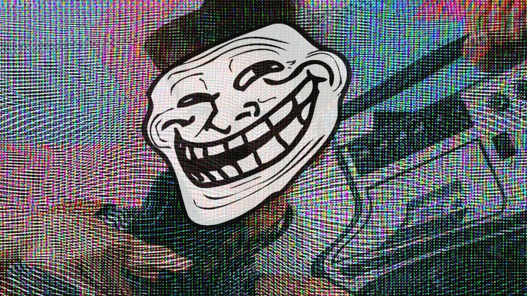 Quand ils arrivent en ligne, partie 2 : la rhétorique de l’énervement une troll face qui tient un ghetto blaster