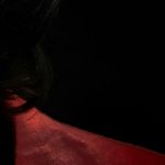 Un bout de visage au maquillage Joker