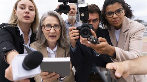 group-people-taking-interview-outdoors
