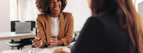 Female financial advisor consulting a client Female financial advisor consulting a client