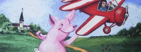 Un avion rouge près d'un cochon