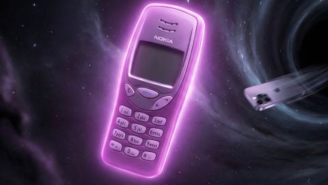 Un smartphone Nokia en premier plan et un IPhone englouti dans un trou noir au fond