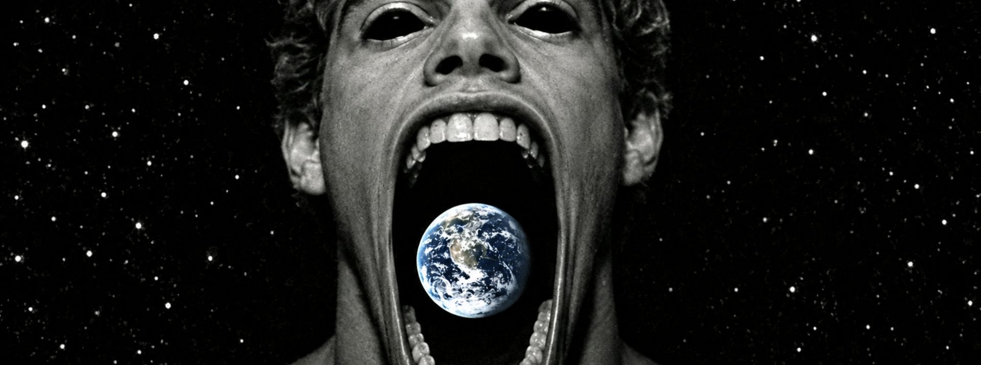 une image noir et blanc de clacular qui mange le monde